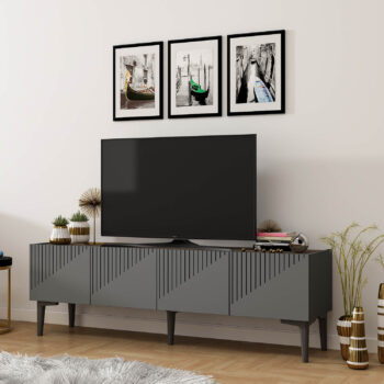Luxusný TV stolík USER do vašej obývačkyElegantný a praktický TV stolík USER je ideálnou voľbou pre vašu obývaciu izbu. Je vyrobený z kvalitného materiálu LTD s hrúbkou 18 mm, ktorý zaručuje dlhú životnosť a odolnosť. Stolík je navrhnutý v modernom luxusnom štýle, ktorý dodá vášmu interiéru nádych elegancie.Kľúčové vlastnosti:Rozmer: 45 x 154 x 37 cmMateriál: LTDPočet dvierok: 2 plné dvierkaFarba: antracitPlastové nožičkyDodávame v demonteTV stolík USER je navrhnutý tak, aby spĺňal požiadavky na funkčnosť aj estetiku. Dve plné dvierka poskytujú dostatok úložného priestoru pre vaše multimediálne zariadenia či iné potreby. Vďaka plastovým nožičkám je stolík ľahko premiestniteľný a vhodný aj na rôzne typy podláh.Užite si pohodlie a štýl, ktorý TV stolík USER prináša do vášho domova!