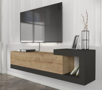 Moderný a štýlový TV stolík VELIERO vás oslový svojim moderným a minimalistickým dizajnom a priaznivou cenou. Je ideálny do moderne zariadených priestorov a vďaka závesnému systému pôsobí vzdušne a štýlovo. TV skrinka poskytuje dostatok úložného priestoru vo forme výklopnej skrinky a malej otvorenej police.Farebné prevedenie: šedý antracit / sapphireMateriál: kvalitné 18 mm LTD hranené PVC páskouRozmery TV stolíka: (š/v/h) 150 x 38,6 x 29,6 cm Dodávame v demonte.