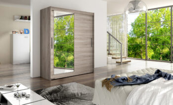 Šatníkovú skriňu VESNA VI dub truflový vystihuje minimalistický, ale moderný dizajn a predovšetkým dostatok úložného priestoru, ktorý potrebujete na uloženie vašeho oblečenia a doplnkov. Skriňa má posuvné dvere so zrkadlom. V jej ľavej časti je vešiaková tyč a v pravej sú priestranné police. V hornej časti sa taktiež nachádza úložný priestor. Skriňu ponúkame aj v ďalších troch farebných prevedeniach. Je vyrobená z LTD dosky s hrúbkou 16 mm. Skriňa má tiež hliníkové ložiskové pojazdy Micra Servoll. Dodávame v demontovanom stave.Rozmery : š/h/v 150/58/200
