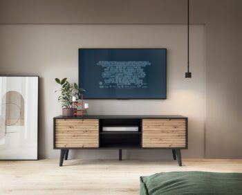 Moderný TV stolík WILLIAM sa stane pýchou každej obývačky. Stolík stojí na čiernych drevených nohách, ktoré mu dodávajú štýlový dizajn a je tak praktický na údržbu. Tiché a jemné otváranie dvierok zabezpečí push to open systém. Štýlové lamelové frézovanie predných čiel sa postará o originálny a zaujímavý dizajn. Farebné prevedenie: dub Artisan / čierna matnáMateriál:  Kvalitná MDF doska, vystužená ABS hranou.ROZMERY: Hĺbka: 39 cmŠírka: 154 cmVýška: 56 cmDodávame v demonte.  