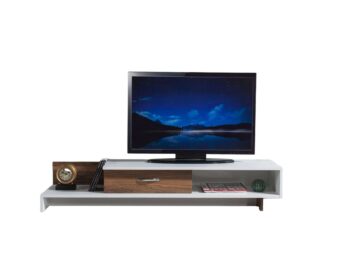 Predstavujeme WRAPS, TV stolík, ktorý prináša do vašej obývačky kombináciu moderného dizajnu a funkčnosti. Tento elegantný nábytok v spojení bielej a orechovej farby je navrhnutý tak, aby poskytoval estetické a praktické riešenie pre vaše multimediálne zariadenia a ďalšie potreby.Detailné špecifikácieTyp tovaru: TV stolíkMateriál: Kvalitná LTD s hrúbkou materiálu 18 mm, zaisťujúca odolnosť a dlhú životnosť.Rozmery: 161.8 x 30.6 x 39 cm, ideálny pre moderné obývacie priestory.Farba: Elegantná kombinácia bielej a orechovej, ktorá dodáva priestoru moderný a príjemný vzhľad.Vybavenie: Regálka a skrinka, poskytujúca dostatok úložného priestoru pre elektroniku, knihy alebo dekorácie.Dodatočné informácie: Produkt je dodávaný v demontovanom stave, čo uľahčuje transport a montáž.TV stolík WRAPS je ideálnou voľbou pre tých, ktorí hľadajú moderný a funkčný nábytok s elegantným vzhľadom. Jeho kombinácia bielej a orechovej farby a minimalistický dizajn prinášajú do vášho domova sviežosť a moderný štýl, zatiaľ čo poskytujú dostatok úložného priestoru pre všetky vaše potreby.
