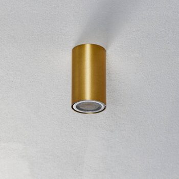 Downlight Eye S v valcovom tvare, mosadz
