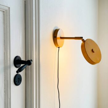 Dyberg Larsen LED nástenné svetlo Starlight, žlté, Ø 14 cm stmievateľné