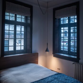 Foscarini Aplomb Mini závesná lampa z betónu hnedá