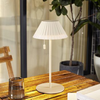 Lindby LED dobíjacia stolová lampa Ilvi, béžová, hliník, Ø 17,5 cm