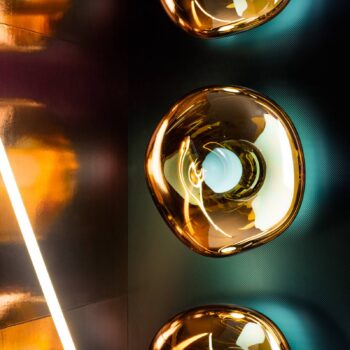 Nástenné svietidlo Tom Dixon LED Melt Surface, Ø 50 cm, jantárovo zlatá