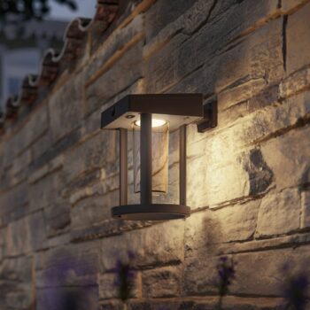 Solárne nástenné svietidlo Philips LED Camill, čierne/čierne, Ø 14 cm