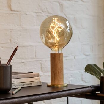 Stolná lampa Tala Knuckle, číre sklo, dub