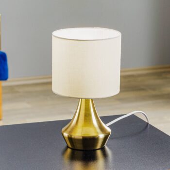 Stolová lampa Ottone s textilným tienidlom, mosadz
