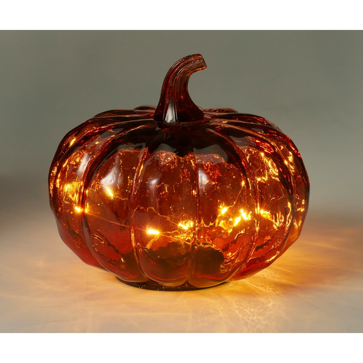 Sklenená svietiaca tekvica 15 x 13 cm, červená, 10 LED diód, na batérie, časovač Sklenená svietiaca tekvica 15 x 13 cm, červená, 10 LED diód, na batérie, časovač