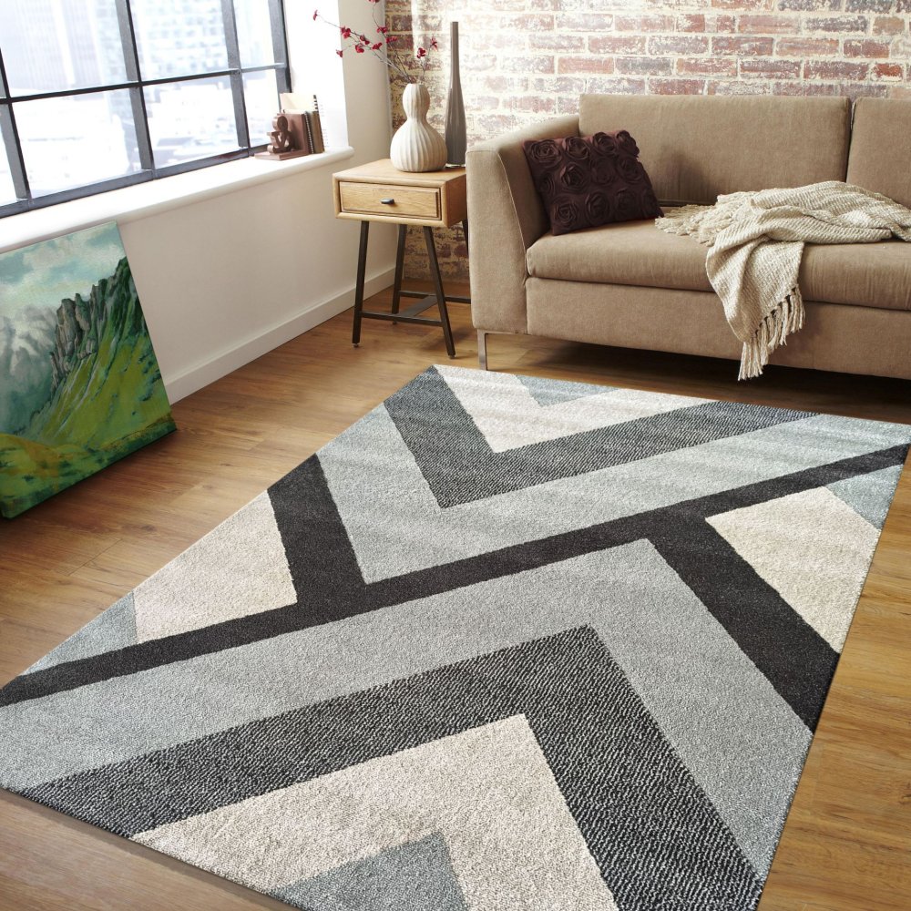 Moderný koberec s geometrickými vzormi v sivých farbách Šírka: 80 cm | Dĺžka: 150 cm Moderný koberec s geometrickými vzormi v sivých farbách Šírka: 80 cm | Dĺžka: 150 cm