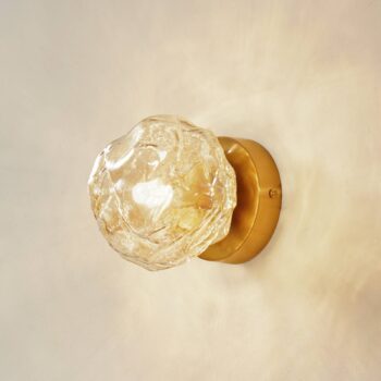 Nástenné svietidlo Lindby Piatra, jantár/mosadz, sklo, Ø 16 cm, G9