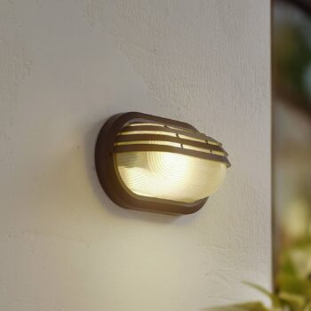 Vonkajšie nástenné svietidlo Lindby Adita, čierne, ABS, výška 16,3 cm