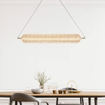 Závesné svietidlo Capsule LED, dlhé, mosadzná farba, železo, akryl